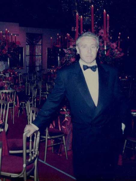 Peter Rowland in a ballroom